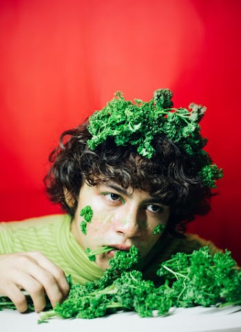 Man Biting a Celery