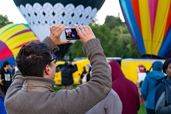 Man Capturing Hot Air Balloon