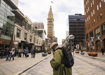 Man Carrying Black Backpack