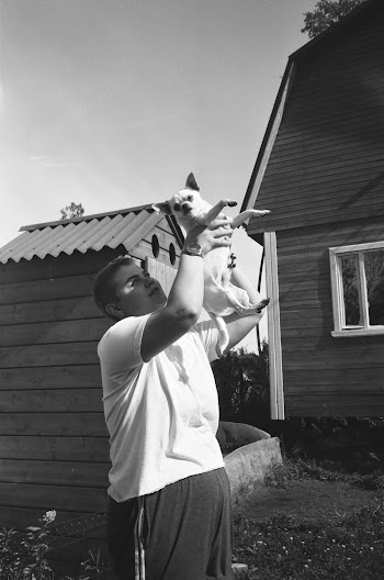 Man Carrying Chihuahua