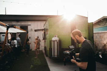 Man Carrying Dslr Camera