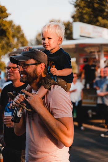 Man  Carrying His Son on His Shoulder