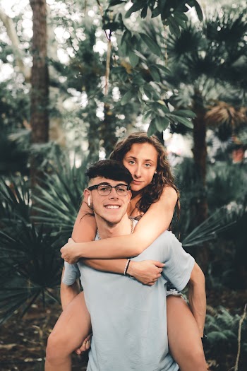 Man Carrying Woman