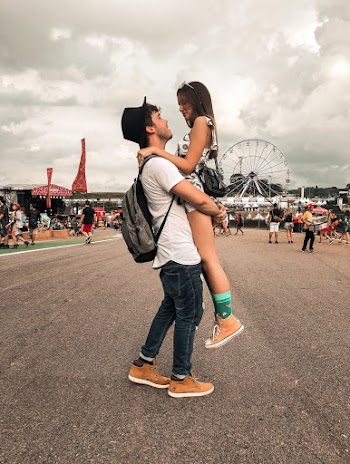 Man Carrying Woman