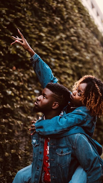 Man Carrying Woman