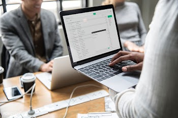 Man checking his email on a laptop | Free stock psd mockup - 414314