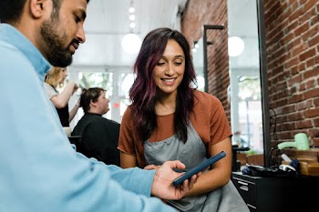 Man choosing a hairstyle at a barber  | Free stock photo | High Resolution image