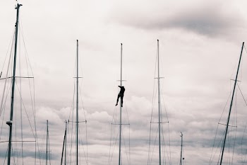 Man Climb on Post