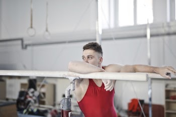 Man Climb on Steel Bar