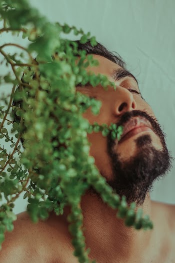 Man Closing Both Eyes