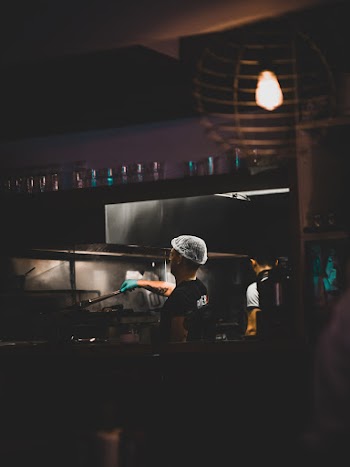 Man Cooking at the Kitchen