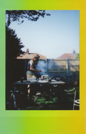 Man Cooking On Grill 