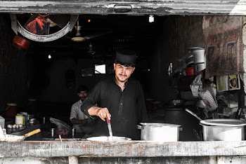 Man Cooks at the Diner