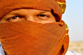 Man Cover Face Using Scarf