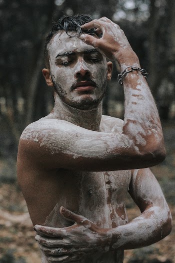 Man Covered in Clay