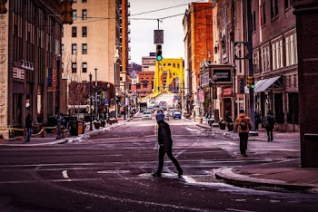 Man Crossing The Street