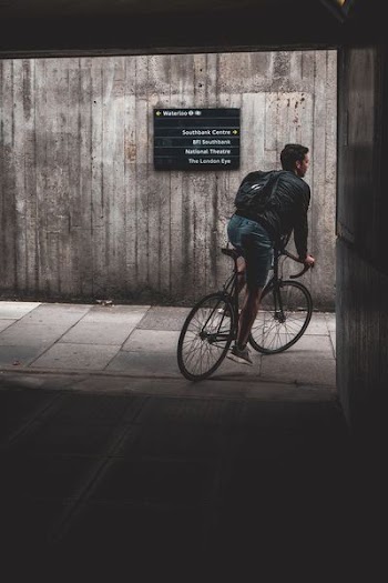 man cycling outdoors