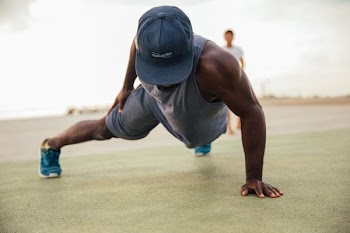 Man Doing One Armed Pushups