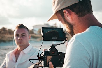 Man Doing Post While Taking on Camera