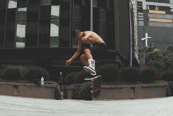Man Doing Skateboard Tricks