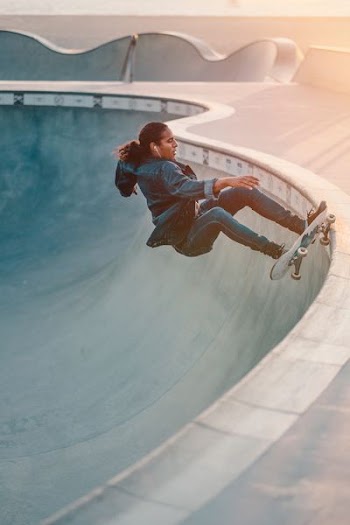 man doing skateboarding in skate park during daytime