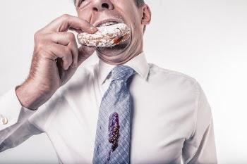 Man Eating Donut Free Photo 