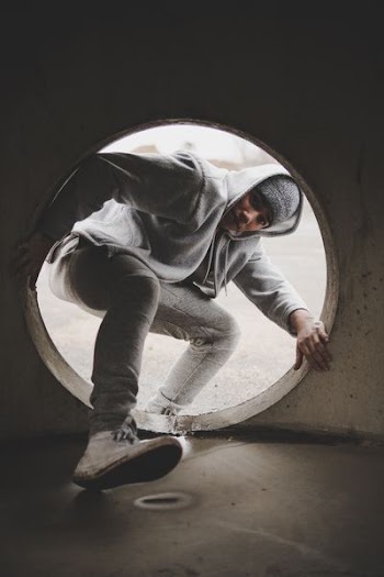man entering hole