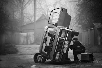Man Fixing a Car 