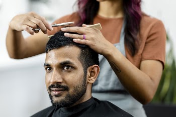 Man getting a haircut from a hair | Free Photo - rawpixel