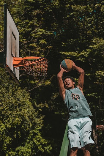Man Going to Dunk on Hoop