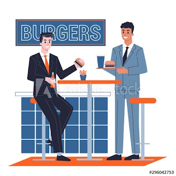 Man having lunch at work with colleagues