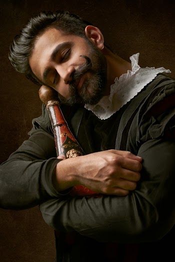 Man Holding A Bottle