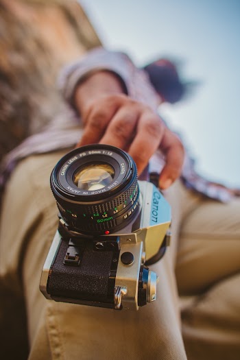 Man Holding A Camera