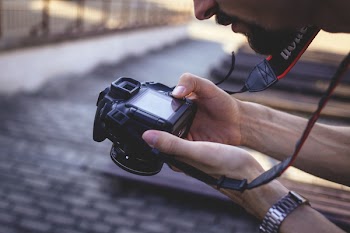 Man holding a camera 2