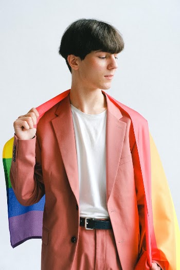 Man Holding a Gay Pride Flag