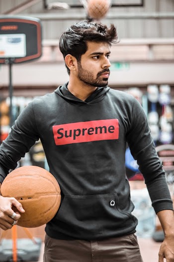 Man Holding Basketb