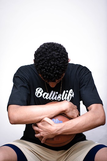 Man Holding Basketball