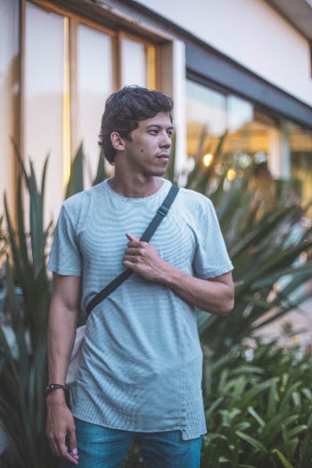 Man Holding Black Bag Strap Outdoor