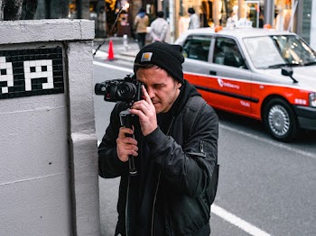 Man Holding Camera