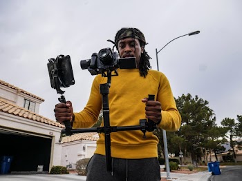 Man Holding Camera