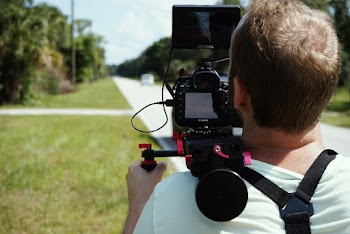 Man Holding Camera