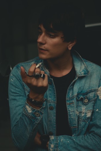 Man Holding Cigarette