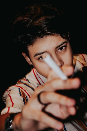 Man Holding Cigarette Stick