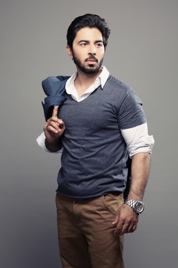Man Holding Coat on Shoulder