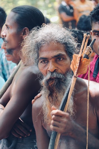 Man Holding Composite Bow