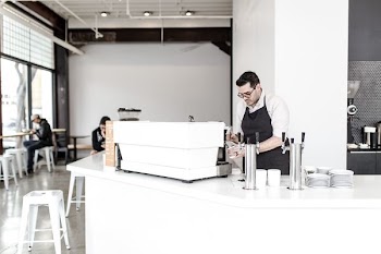 man holding cup