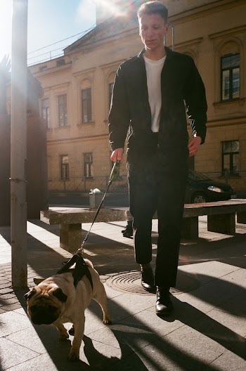 Man Holding Dog Leash
