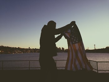 Man Holding Flag of Usa