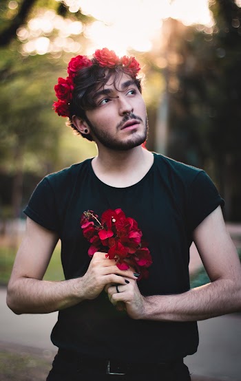 Man Holding Flowers