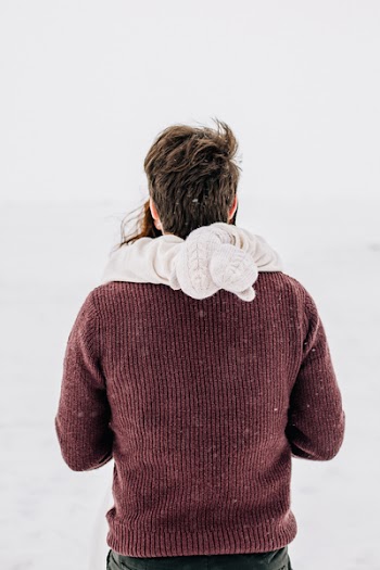 Man Holding Girl